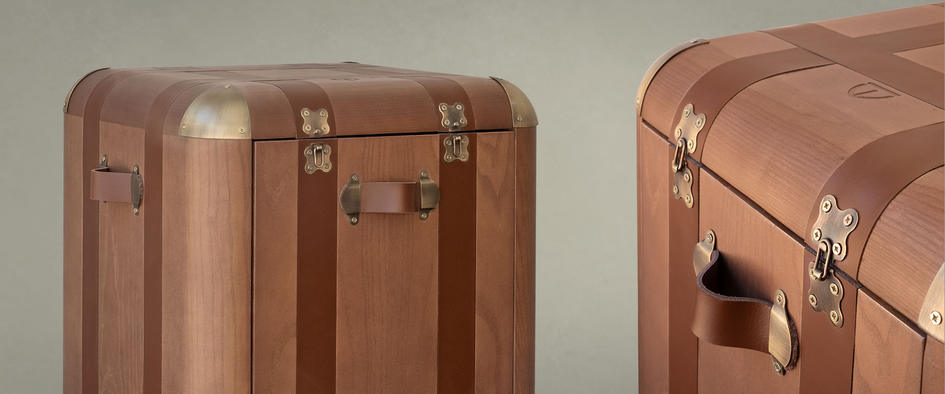 Burke Side Table Close-up of the Burke side table with two different views highlighting the handles and leather straps.