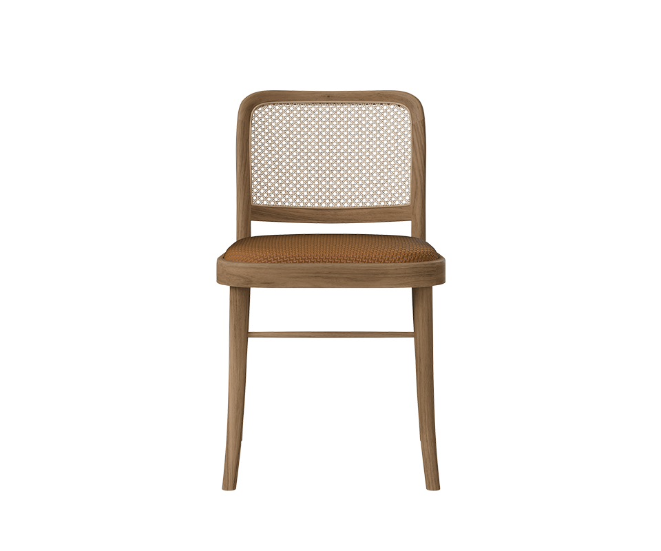 Frontal view of the armless Charles I Dining Chair highlighting the curved oak top rail, natural woven cane backrest, and textured tan braided leather seat.