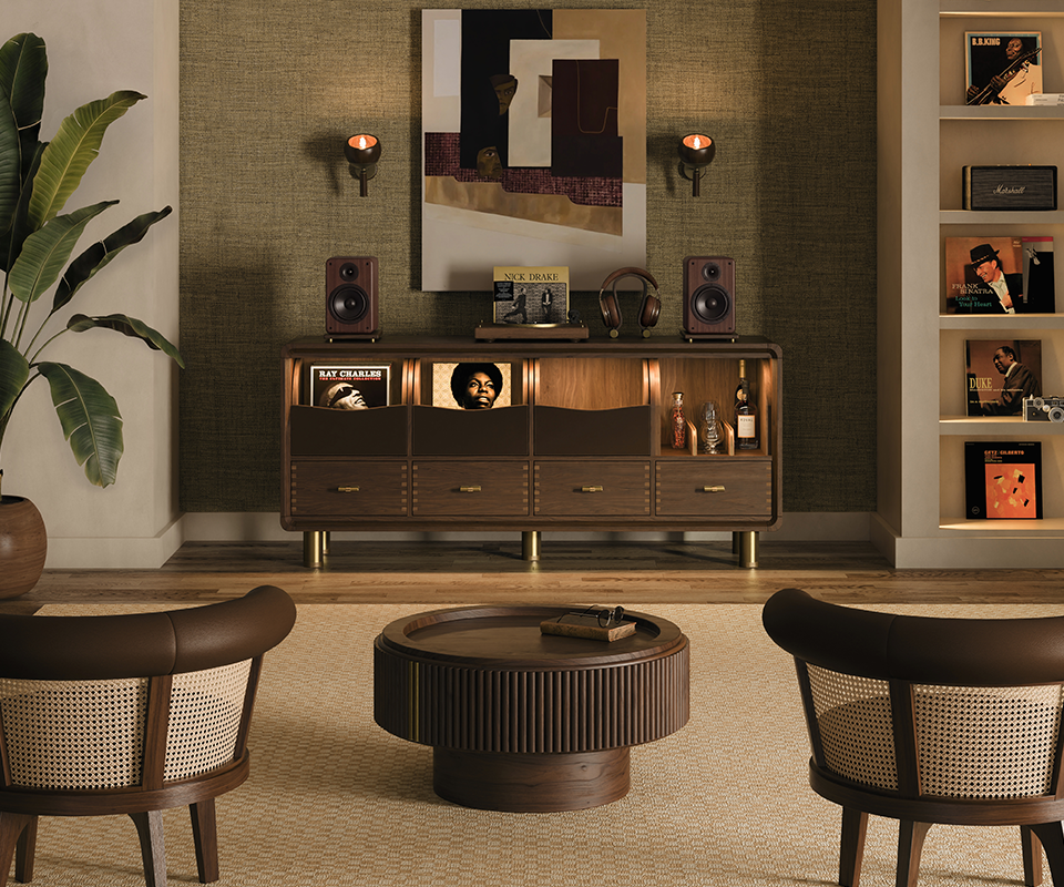 Luxurious contemporary music lounge featuring the handcrafted Edward Sideboard by Wood Tailors Club set against a textured wall, styled with audio equipment, vinyl records, and spirit bottles in an elegant interior with george armchairs and robert center table.