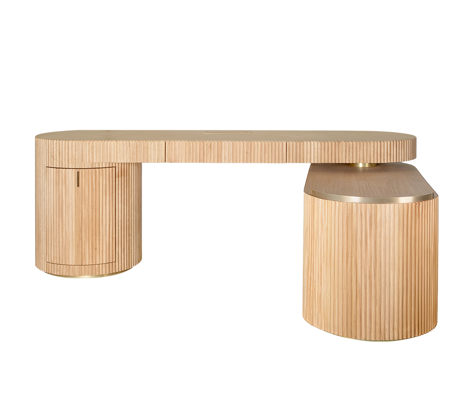 Gifford Desk Gifford desk by Wood Tailors Club in oak. Front view with the lower oak shelf module rotated 90 degrees forward, revealing two open interior shelves for storage, adjacent to the fluted oak cabinet on the left. Brass leg accents.