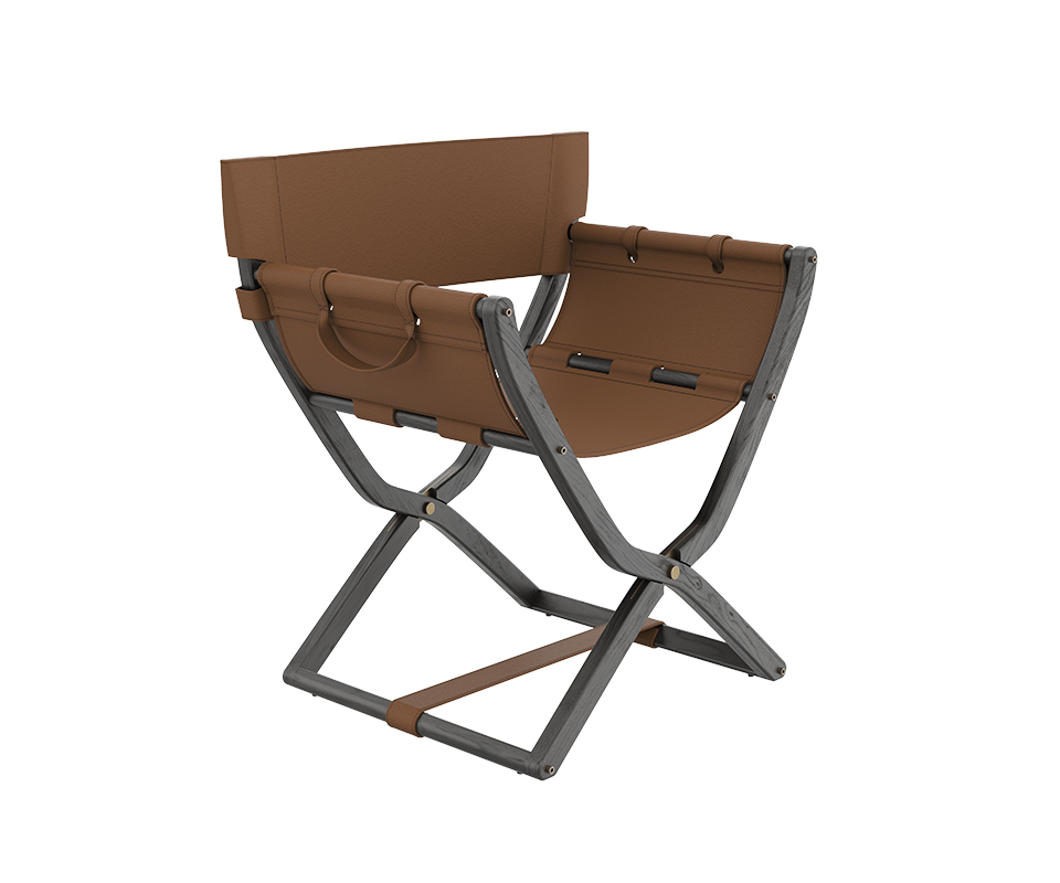 Korda Folding Chair by Wood Tailors Club featuring a dark, ash-colored wooden frame with visible grain, paired with rich cognac brown leather upholstery and brass hardware.