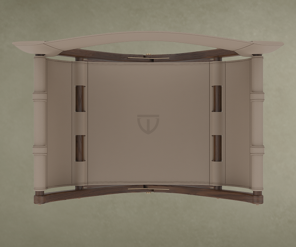 Korda Folding Chair Top-down detailed view of the Korda Folding Chair by Wood Tailors Club, showcasing the premium beige leather seat with an embossed logo, supported by a handcrafted dark wood frame.