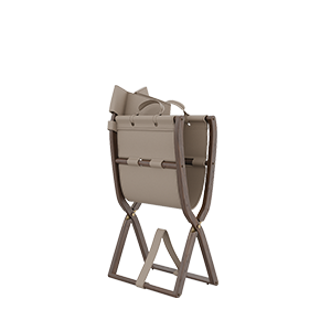 An angled view of the Korda chair partially folded, demonstrating its versatility and the premium craftsmanship of the leather straps and joint mechanisms.