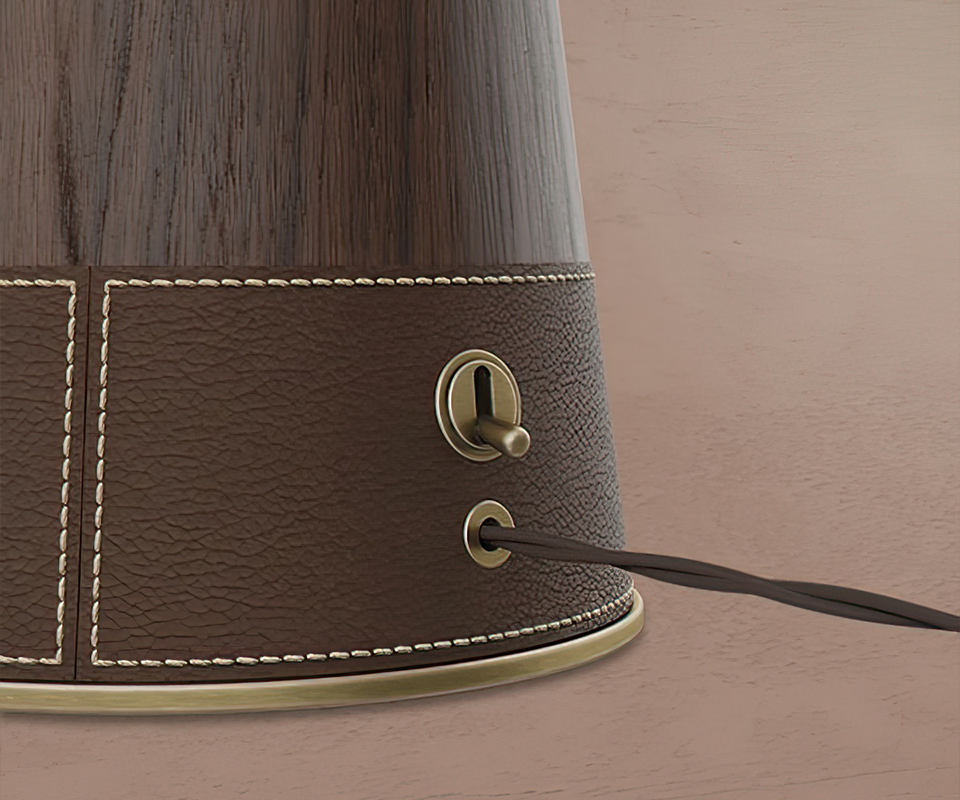 Lloyd II Table Lamp switch close-up showcasing the leather details.