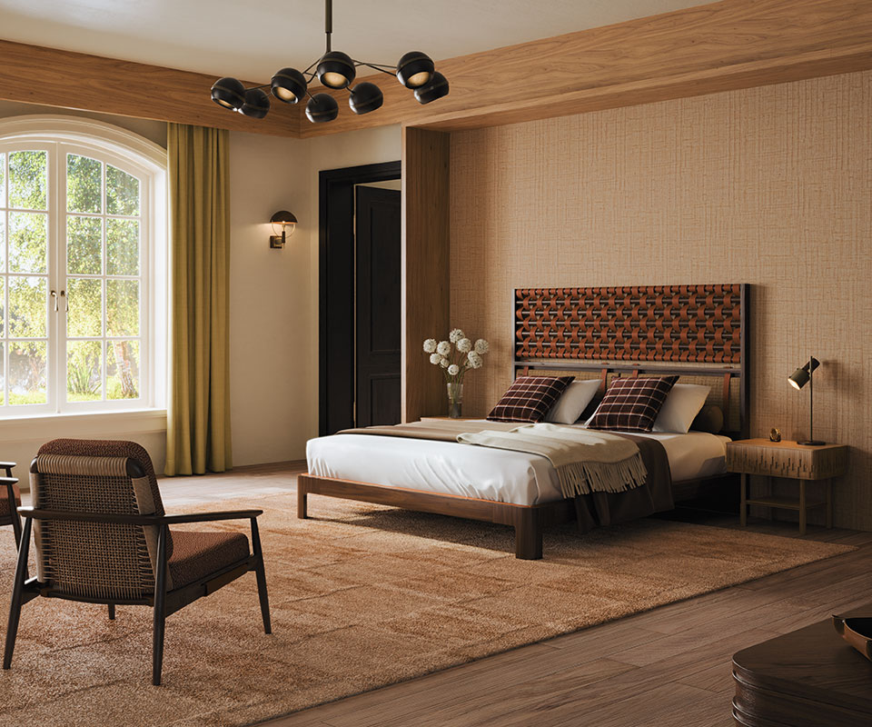 O'Connell II Bed O'Connell II Bed with a headboard featuring leather details in Prestige fabric from Élitis, set in a bedroom with Élitis Abaca wallpaper, a rug by Kelly Wearstler, and Ralph Lauren Wallace throw pillows. The space also includes an Adam armchair upholstered in Melbu 11093.52 fabric by Nobilis, a Fleming suspension lamp, and a Faraday wall lamp.