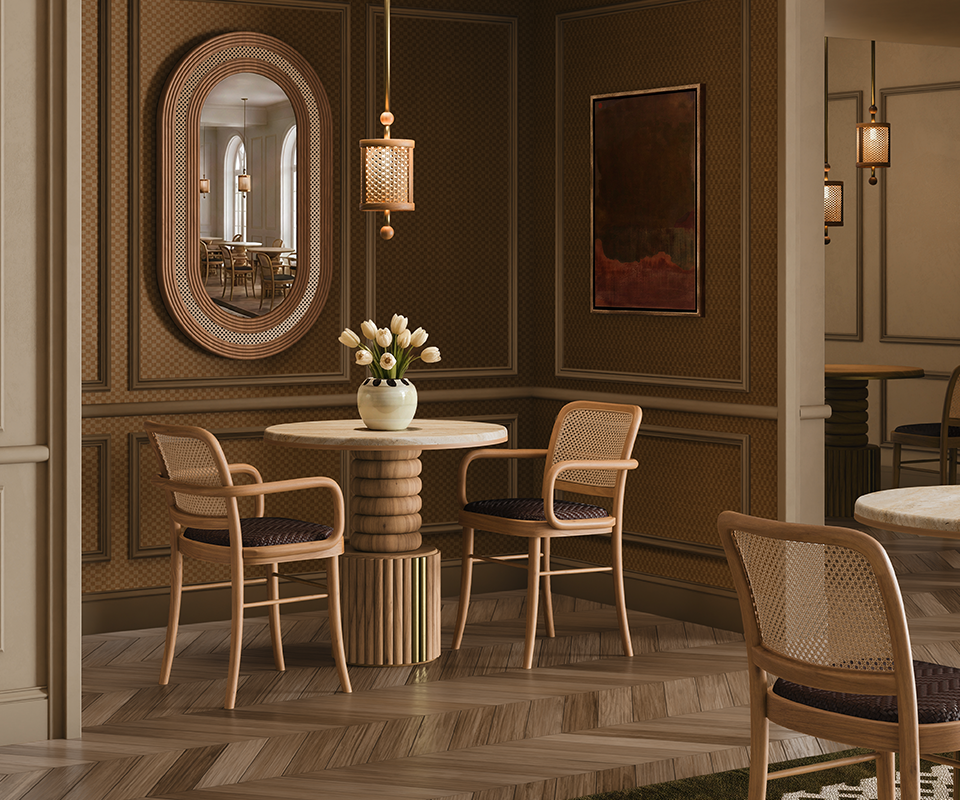 Stuart II Dining Table by Wood Tailors Club set in a luxurious, classic dining room with matching woven-back chairs, the Charles II dining chair, herringbone wood floors, an oval Hudson mirror, and the hamilton elegant pendant lighting.